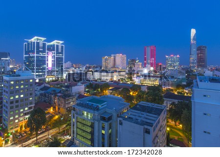 HO CHI MINH CITY, VIETNAM - APRIL 16, 2013 - Skyline by night of inner-city Ho Chi Minh City