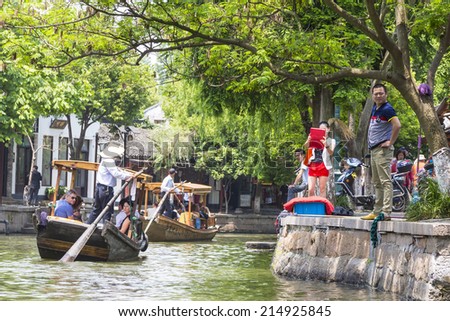 15 MAY 2014 - SHANGHAI, CHINA - Boat on canal in the old water town of Zhujiajiao, near Shanghai