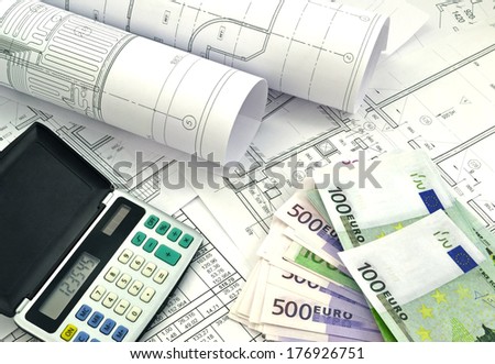Image of several drawings of the project and money/Project drawings and  money