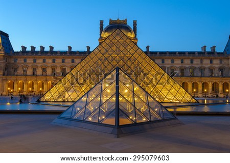 PARIS, FRANCE - JUNE 18 : night scene of the Louvre Museum in Paris on June 18, 2015. Louvre Museum is one of the most popular museums of the world.
