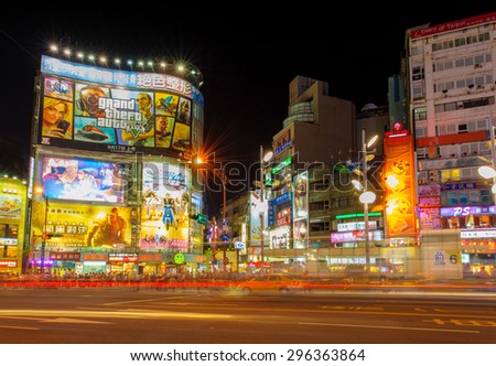 TAIPEI, TAIWAN - September 4, 2013: Night view of Ximen District in Taipei on September 4, 2013, where attracts over 3 million shoppers per month.