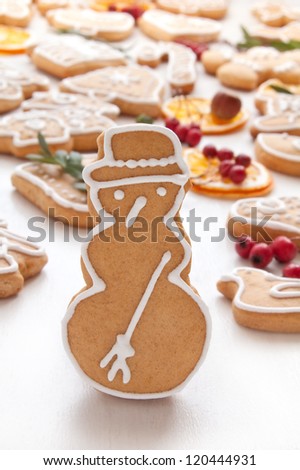 Gingerbread cookies in shape of snowman on the white background