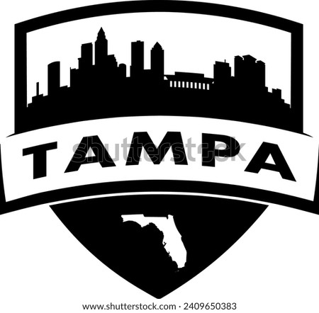 City of Tampa Florida black and white shield style city buildings silhouette shield graphic with knockout white outline of the state border shape under name. Vector eps design. 