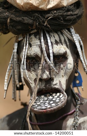 ETHIOPIA - UNKNOWN: A female member of the Mursi (or Murzu) woman wearing plate in her lower lips in this undated image taken in the Debub Omo Zone area of Ethipoia.