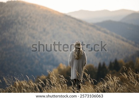 Similar – Foto Bild Tourist mit Blick auf Bergwasserfall