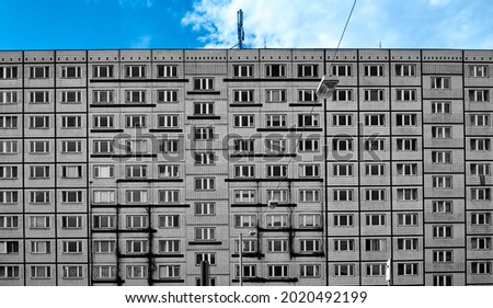 Image, Stock Photo monotonous prefabricated building facade with clouds