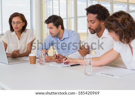 Group of young business people in meeting at the office