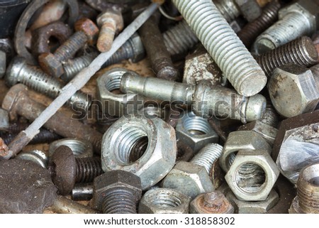 Old nut and bolts for background