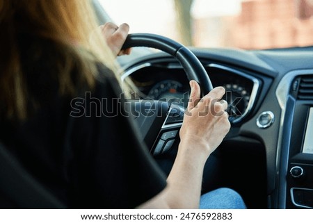 Similar – Image, Stock Photo Close up of female hands typing on laptop keyboard at home near his unrecognizable girlfriend. Business, working from home, studying online concept.