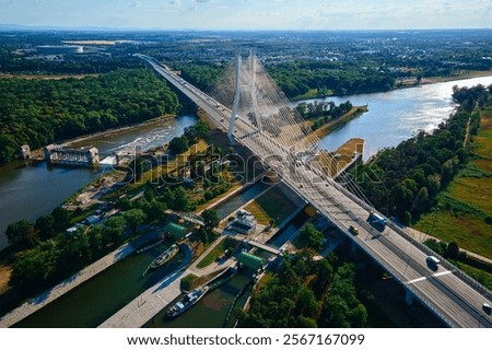 Similar – Image, Stock Photo Large bridge over river with cars traffic