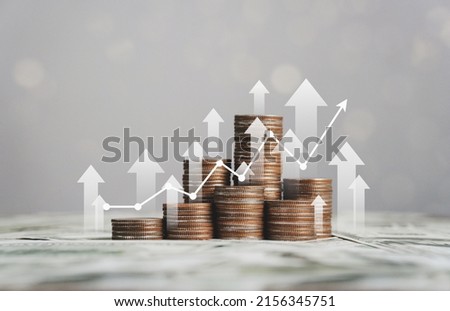 stack of silver coins with trading chart in financial concepts and financial investment business stock growth ストックフォト © 