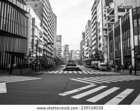 TOKYO, JAPAN - OCT 31, 2014: intersection Asakusa  ahead Sensoji temple district in Tokyo, Japan. (black and white)