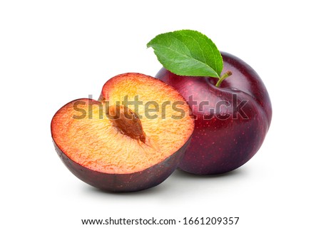 Juicy red Plum fruits with cut in half and green leaf isolated on white background.