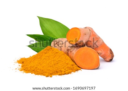 Turmeric (Curcuma longa Linn)  rhizome (root) sliced with Finely dry powder and green leaves isolated on white background.