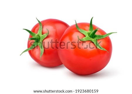 Two Juicy red tomatoes  isolated on white background.