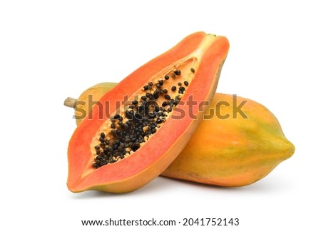 Foto Bild Halbierte Papaya auf blauem Hintergrund. Platz zum Kopieren.