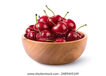 Similar – Image, Stock Photo Ripe cherries in wooden basket on grass. Container full of fruits