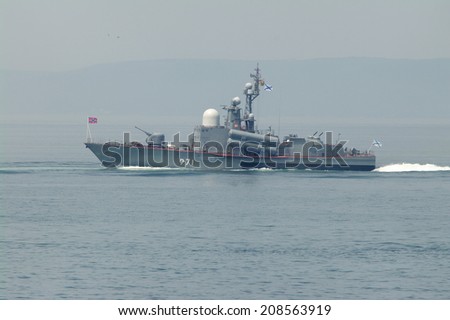 VLADIVOSTOK, RUSSIA - JULY 27: Small missile ship of the Russian Pacific Fleet at the naval parade in the Amursky Bay on the Day of of the Navy Russian, July 27 2014, Vladivostok, Russia.