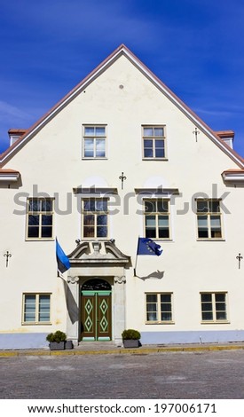 White ancient house of Old Town against deep blue sky. Tallinn, Estonia