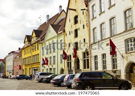 TALLINN, ESTONIA - MAY 3 2014: Street in old town. Cars parked in the historical part of city on May 3, 2014 in Tallinn, Estonia. Tallinn is a capital of Estonia