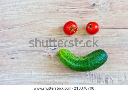 Funny smiling face. Conceptual image with vegetables. Face at the right part of image