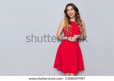 Similar – Image, Stock Photo Elegant woman in dress on brown background
