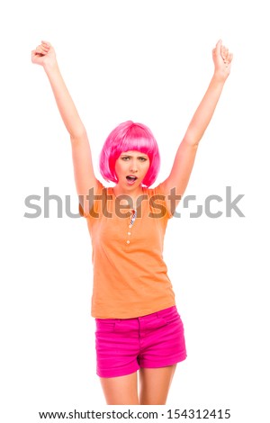 Winner young woman celebrating success. Three quarter length studio shot isolated on white background.