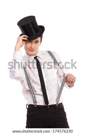 Happy young man  taking hat off. Three quarter length studio shot isolated on white.