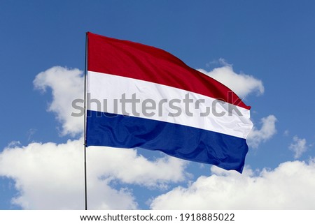 Netherlands flag isolated on the blue sky with clipping path. close up waving flag of Netherlands. flag symbols of Netherlands. ストックフォト © 