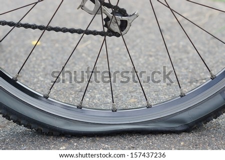 bicycle flat tire on road