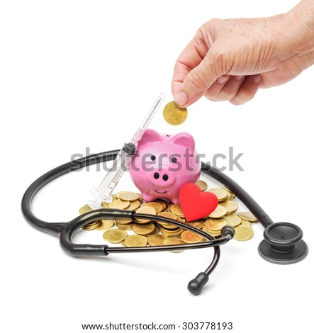 hand of a female elderly putting golden coin into a pink piggy bank with syringe, red heart, and a stethoscope - The elderly saving money for healthcare