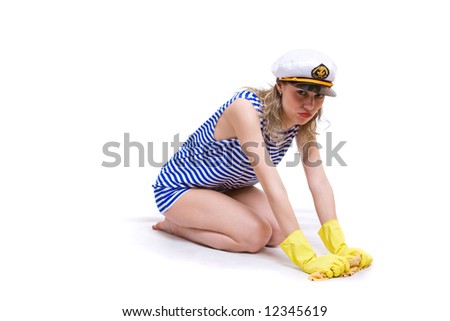 sailor in striped clother is washed ship deck. Isolated in white