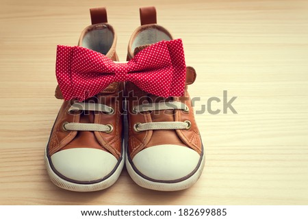 Bow tie and sneakers