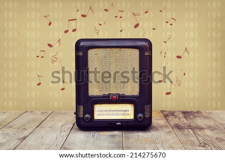 Retro radio and musical notes. Vintage radio