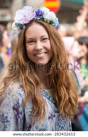 STOCKHOLM, SWEDEN - MAY 31, 2015. Peace and Love Parade. Street party in Stockholm, Dancing young woman.