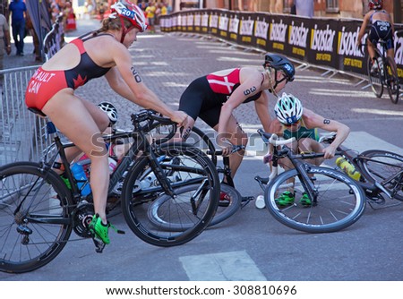 STOCKHOLM - AUG, 22:  Woman ITU World Triathlon  event Aug 22 2015. woman cycling in Old town. McShane was involved in a crash just after a curve.