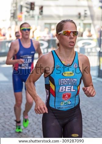STOCKHOLM - AUG, 22:  Woman ITU World Triathlon  event Aug 22 2015. woman running in Old town. Katrien Verstuyft. BEL