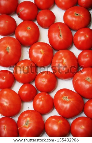 Home grown tomatoes background photo, from a street market