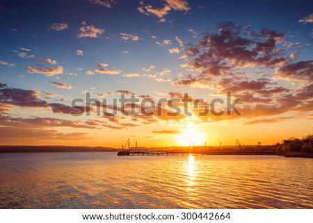 Beautiful cloudscape over the lake, sunset shot