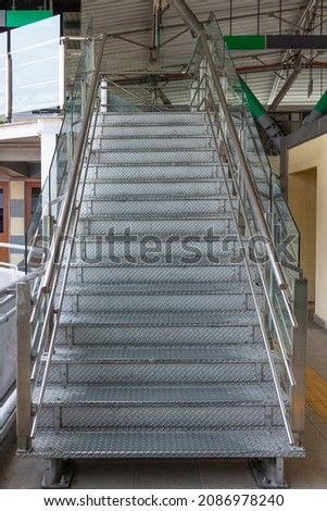 Similar – Image, Stock Photo Exterior metal stairs in black and white