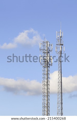 Twin telephone tower and blue sky