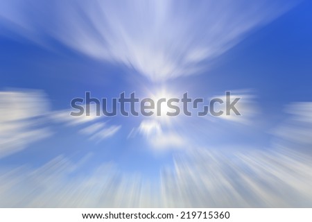 moving clouds and sun with blue bright sky