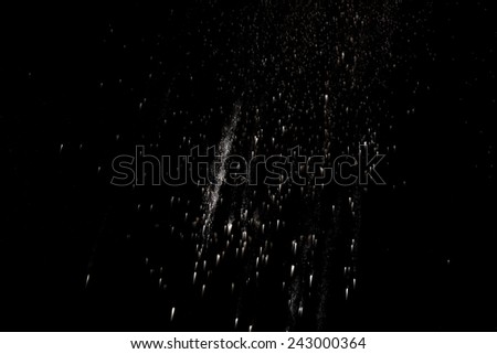 white flour splash on white black background