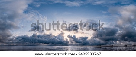 Similar – Image, Stock Photo Dramatic sky during sunset over a lake in Cambodia