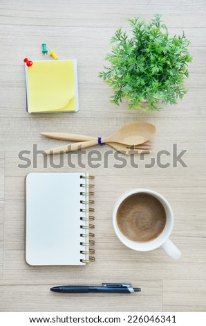 Background blank paper and office tools on the wood table - Top view