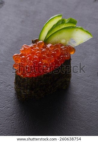 Sushi gunkan on a stone plate