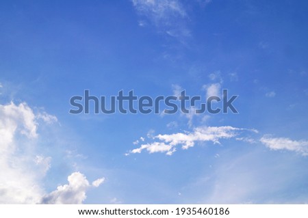 white clouds on the blue sky perfect for the background