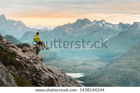 Similar – Image, Stock Photo Man standing in volcanic valley during trip