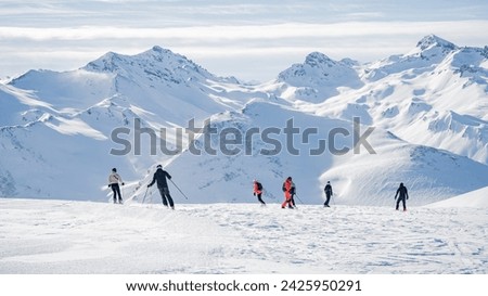 Similar – Foto Bild Gipfel hoher schneebedeckter Berge bei Sonnenuntergang