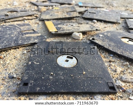 Similar – Image, Stock Photo A discarded floppy disk looks wistfully at the USB stick, which the mouse pointer prefers